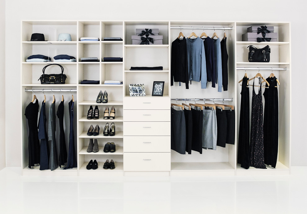 Large elegant gender-neutral reach-in closet photo in Los Angeles with white cabinets and flat-panel cabinets