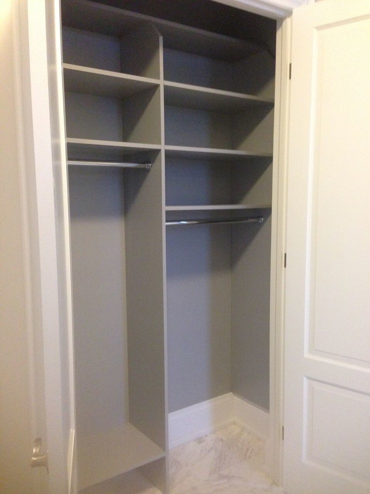Medium sized classic standard wardrobe in Toronto with recessed-panel cabinets and white cabinets.