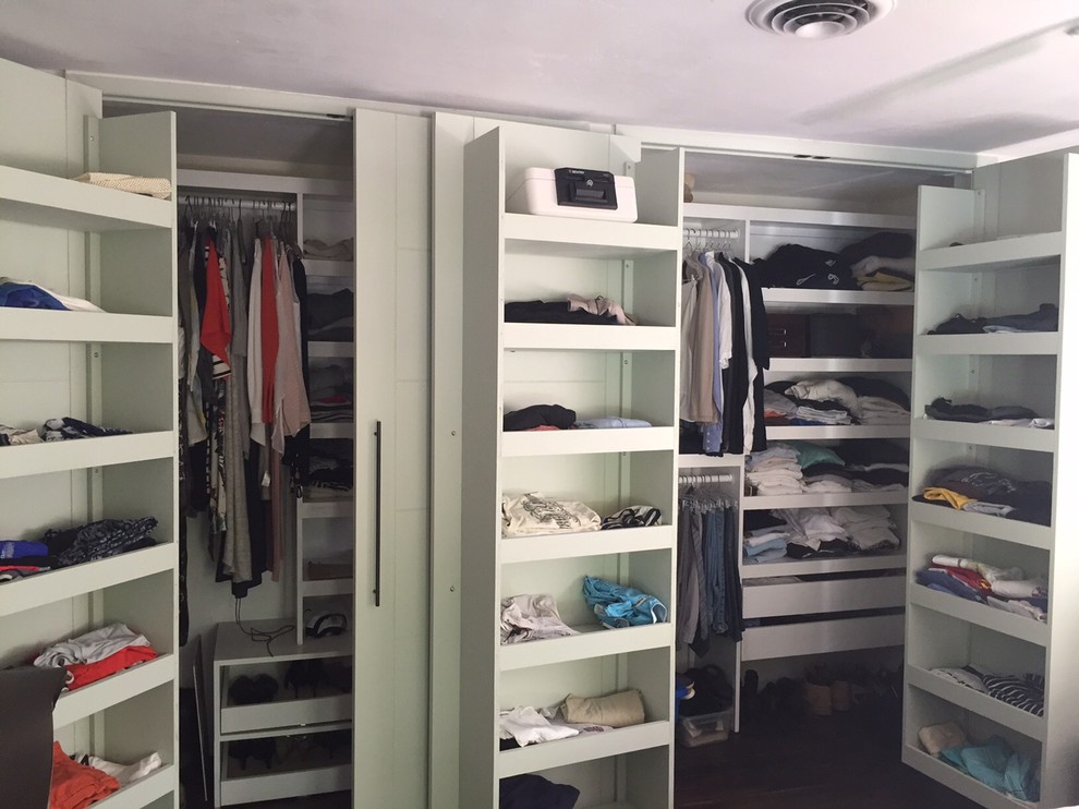 Medium sized traditional gender neutral walk-in wardrobe in Miami with open cabinets, white cabinets and carpet.