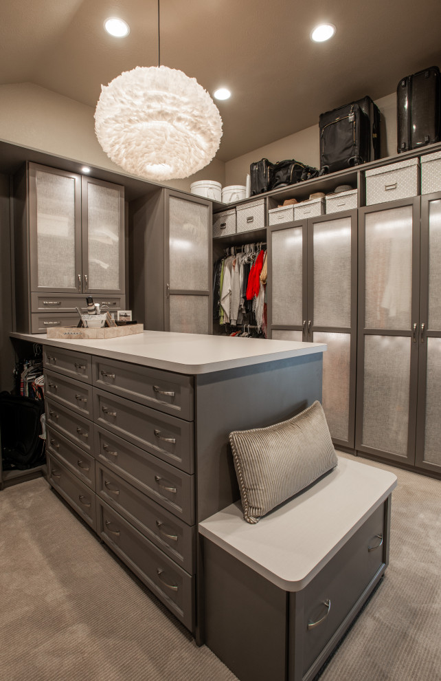 Photo of a medium sized classic gender neutral walk-in wardrobe in Denver with open cabinets, grey cabinets, carpet and grey floors.