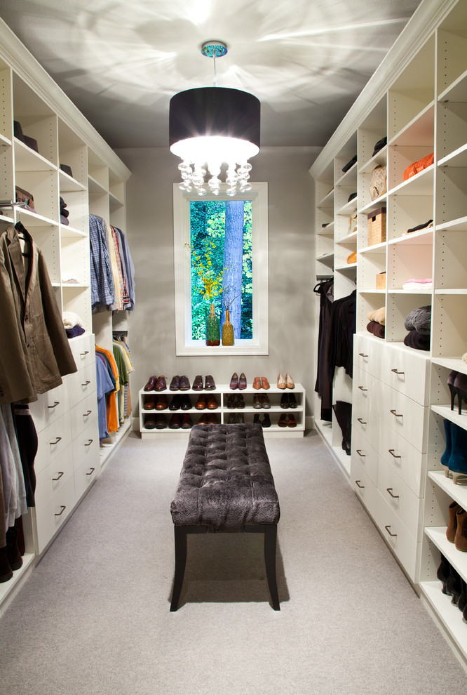 Dressing room - transitional carpeted dressing room idea in Los Angeles with open cabinets and white cabinets