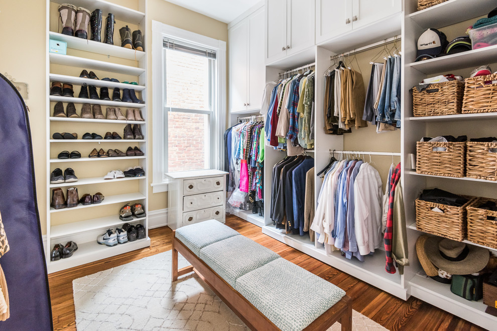 Inspiration for a medium sized classic gender neutral walk-in wardrobe in Richmond with shaker cabinets, white cabinets, brown floors and dark hardwood flooring.