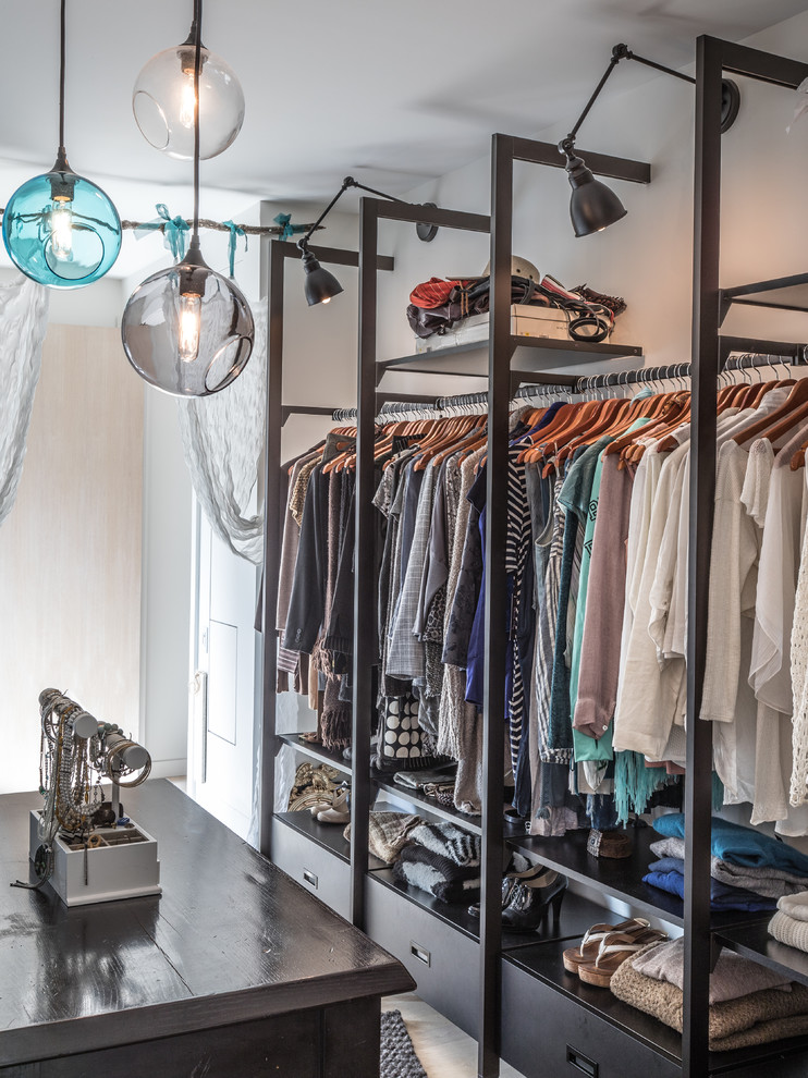 Inspiration for an eclectic dressing room remodel in Toronto with open cabinets