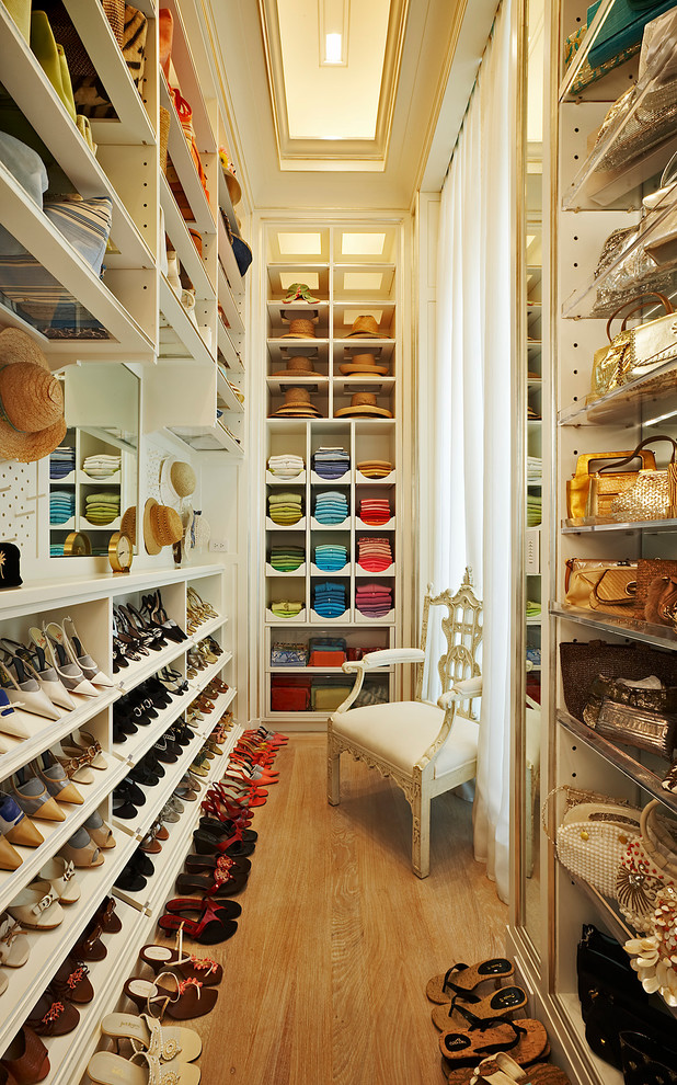 Inspiration for a timeless walk-in closet remodel in New York