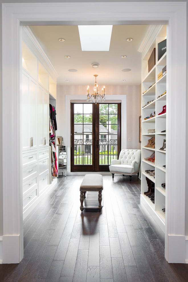Photo of a classic dressing room for women in Vancouver with shaker cabinets and white cabinets.