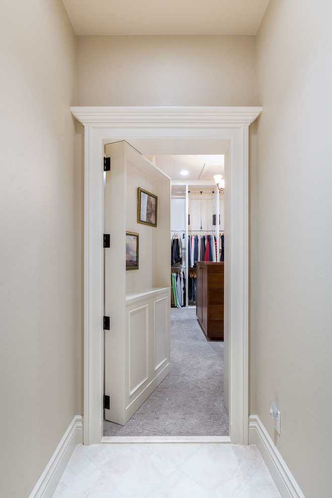 Walk-in closet - large rustic walk-in closet idea in Denver