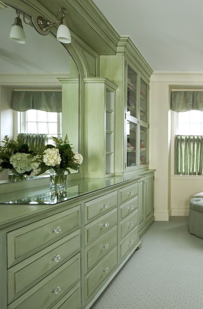 Large elegant women's carpeted and gray floor dressing room photo in Bridgeport with raised-panel cabinets and green cabinets