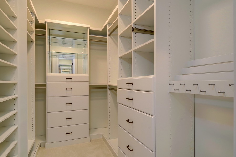Walk-in closet - large farmhouse men's carpeted and beige floor walk-in closet idea in Raleigh with flat-panel cabinets and white cabinets
