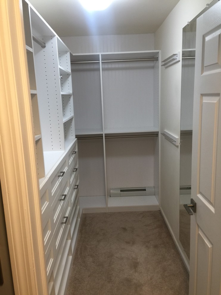 His and Hers Walk-in Closets with wainscott backing and other closets ...