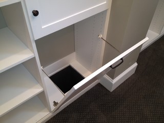 Hand Made Custom Laundry Chute And Hall Storage Unit by Built