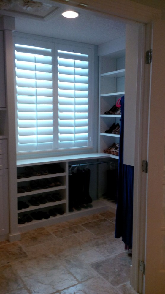 Example of a beach style closet design in Miami