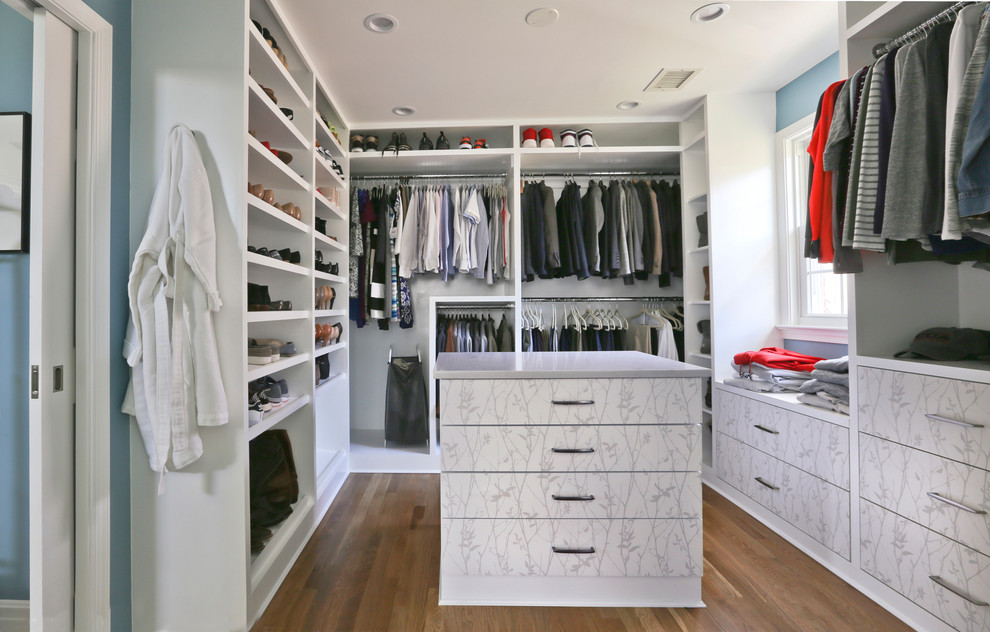 Walk-in closet - mid-sized mid-century modern walk-in closet idea in DC Metro with flat-panel cabinets