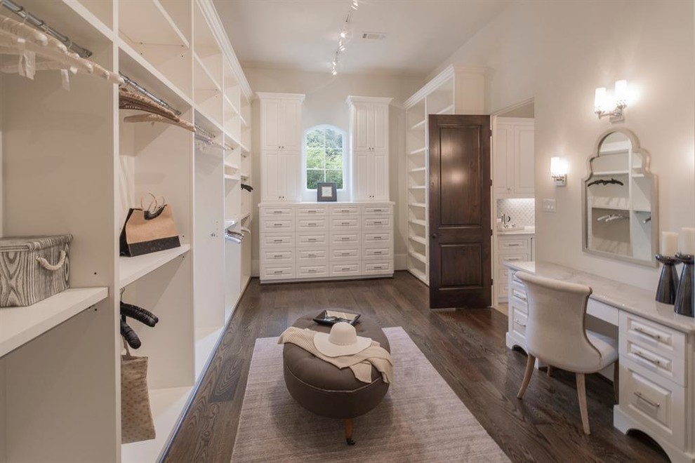 Example of a transitional closet design in Houston