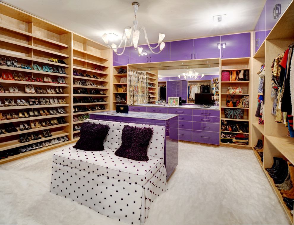 Inspiration for a contemporary women's dressing room remodel in Atlanta with open cabinets and light wood cabinets
