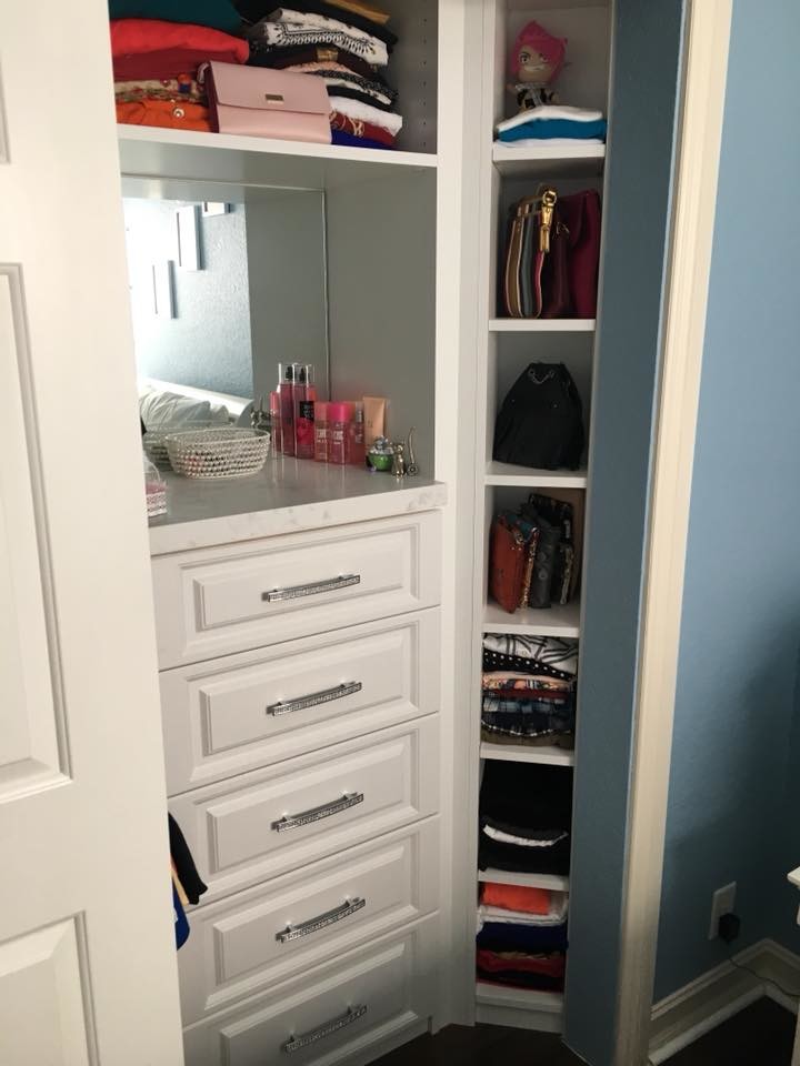 Reach-in closet - small traditional women's carpeted and gray floor reach-in closet idea in Miami with raised-panel cabinets and white cabinets