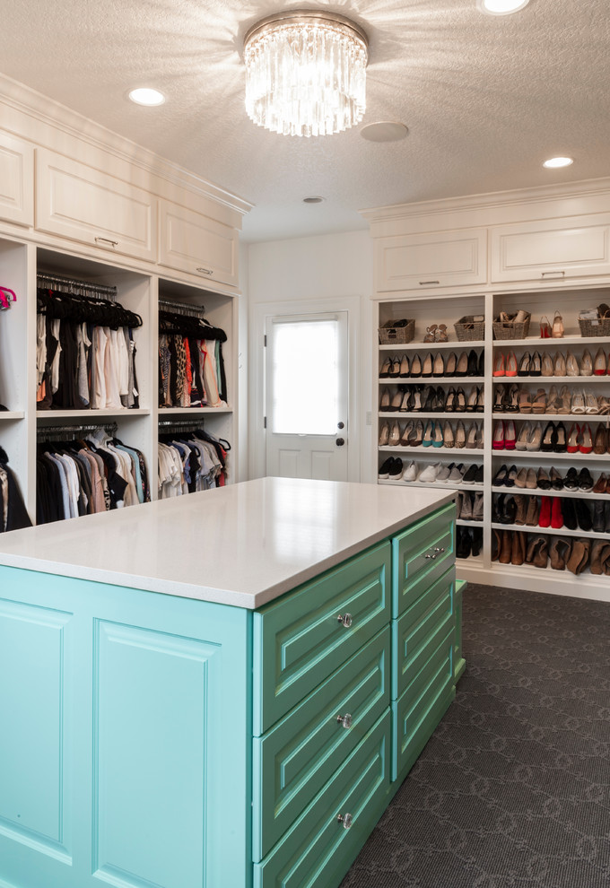 Walk-in closet - huge transitional gender-neutral carpeted and gray floor walk-in closet idea in Portland with beaded inset cabinets and blue cabinets