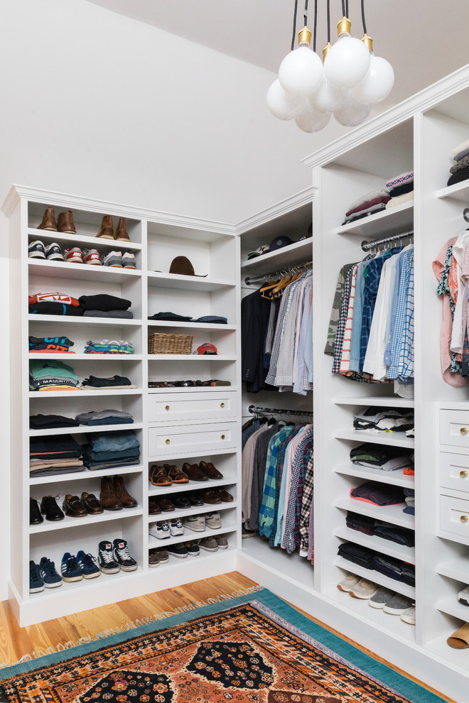 Inspiration for a country walk-in closet remodel in Boston