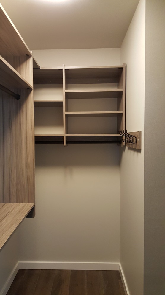 Design ideas for a medium sized contemporary gender neutral walk-in wardrobe in Seattle with open cabinets, medium wood cabinets and dark hardwood flooring.