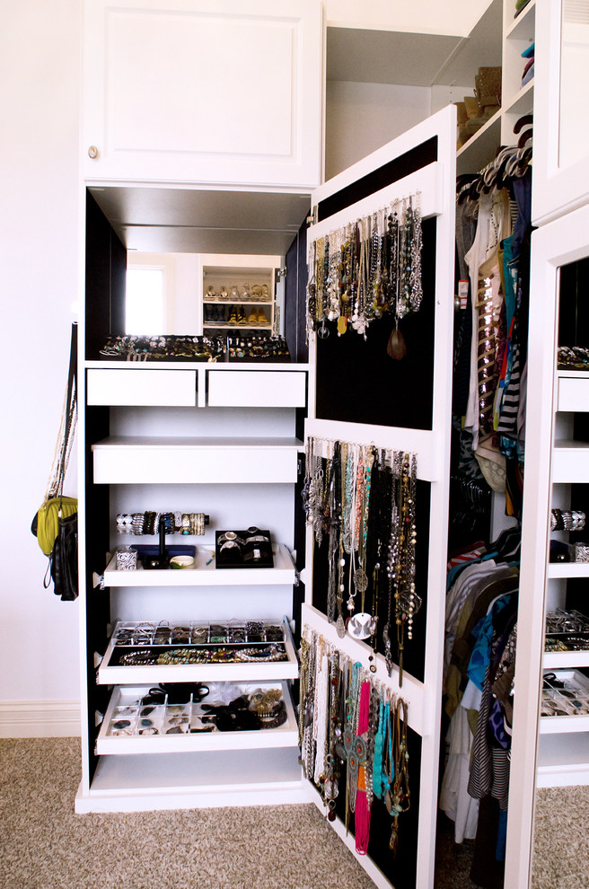 Walk-in closet - traditional carpeted walk-in closet idea in Indianapolis