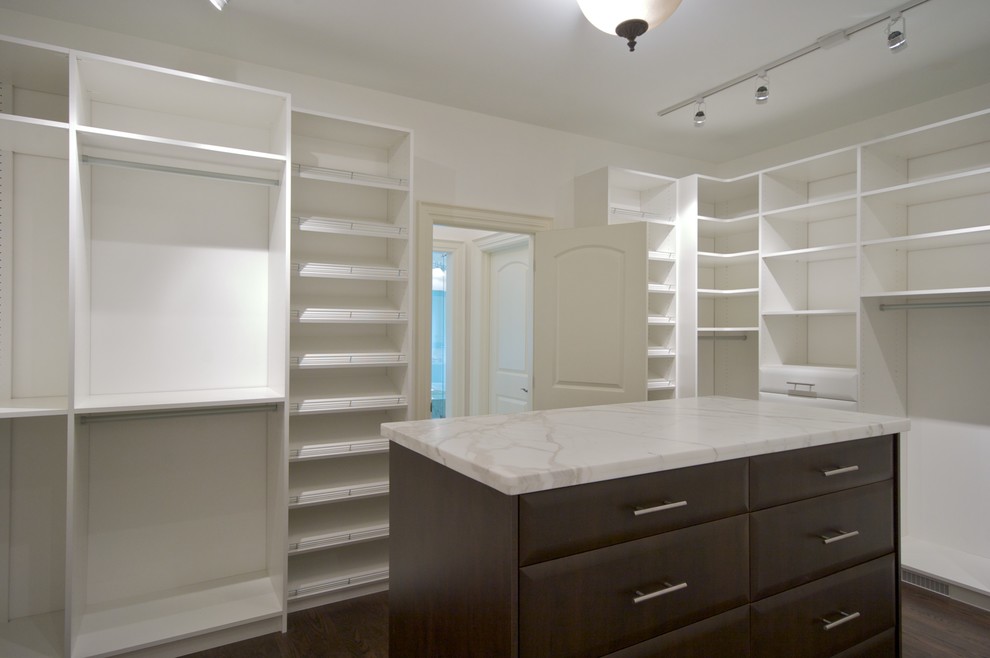 Marble island, in a dressing room. Contemporary Closet Toronto