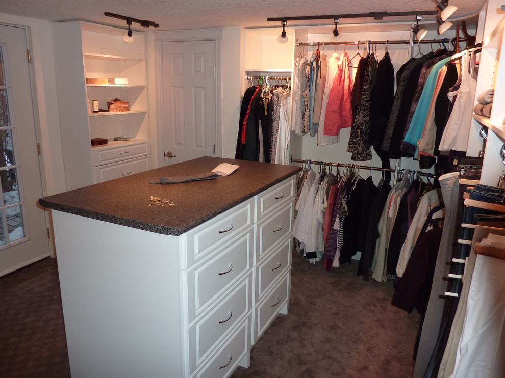 Master Closet with doublewide island, in White Traditional Closet