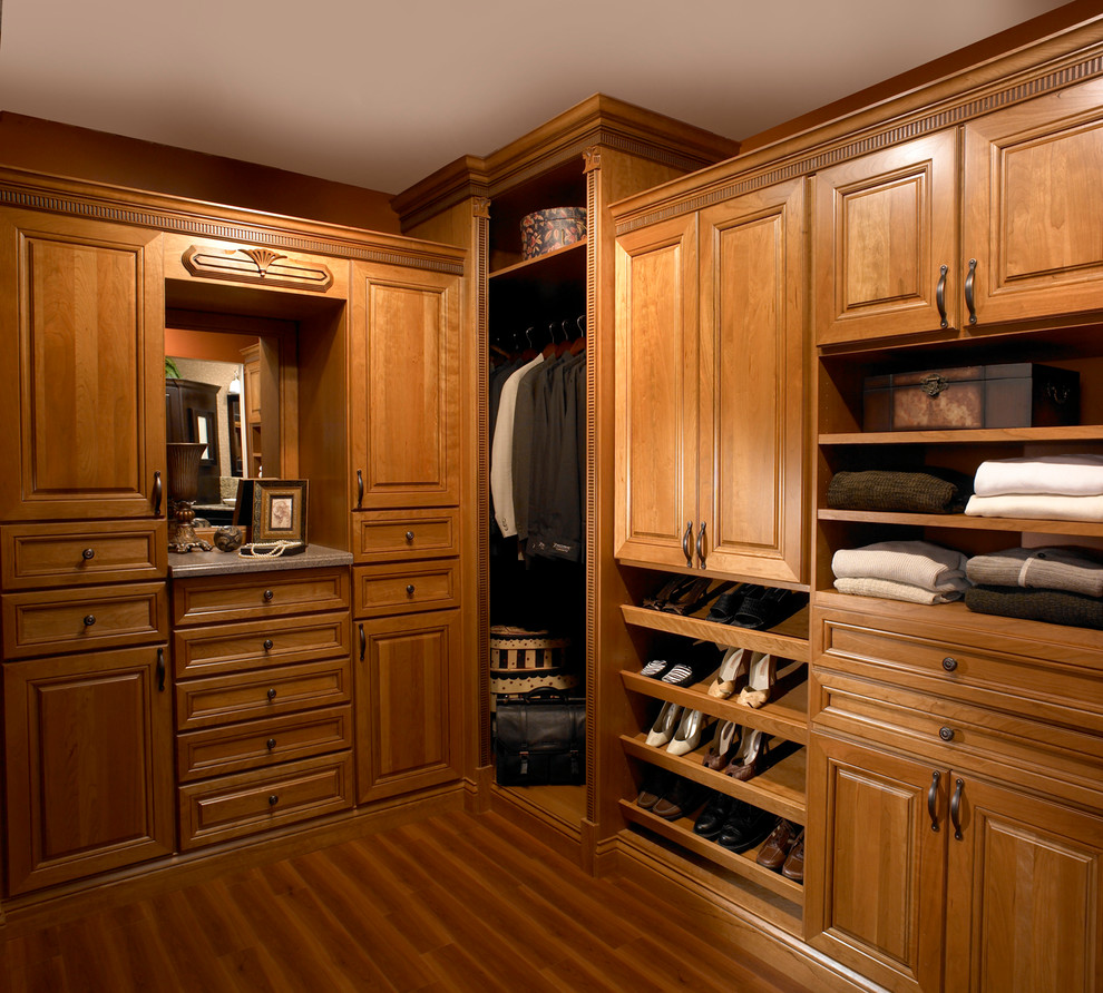 Inspiration for a closet remodel in Other with medium tone wood cabinets