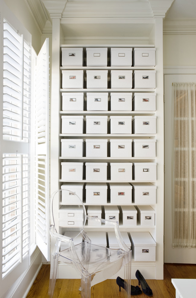 Inspiration for a transitional medium tone wood floor closet remodel in DC Metro with open cabinets and white cabinets