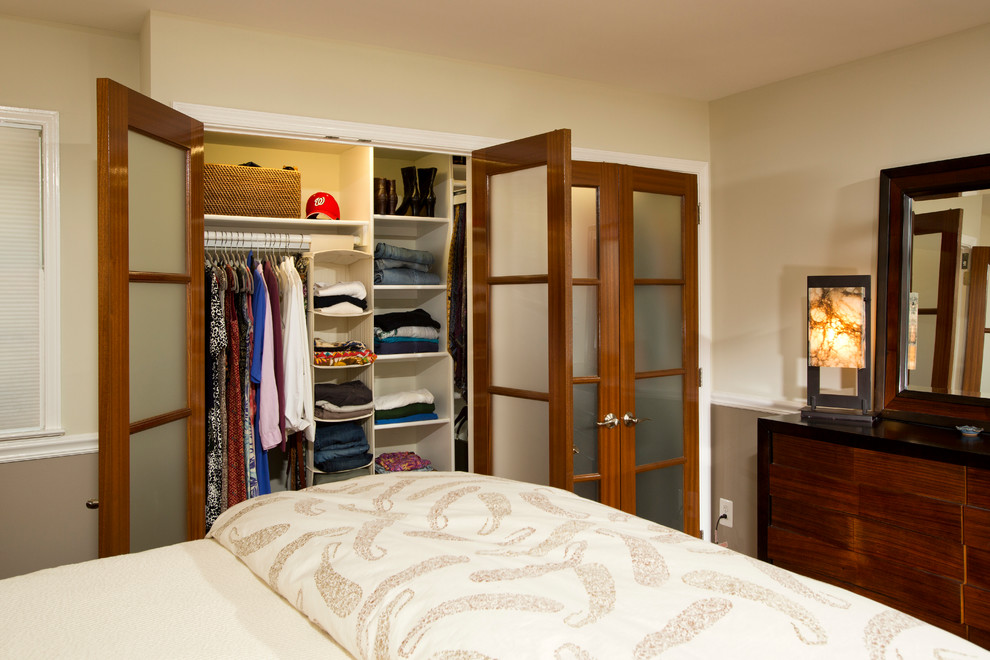 Inspiration for a small craftsman gender-neutral medium tone wood floor reach-in closet remodel in DC Metro