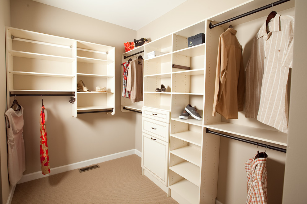 Walk-in closet - huge craftsman carpeted walk-in closet idea in DC Metro with white cabinets