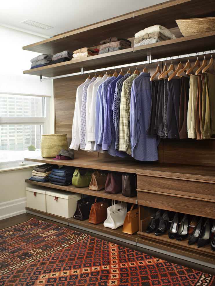 Example of a trendy walk-in closet design in Toronto