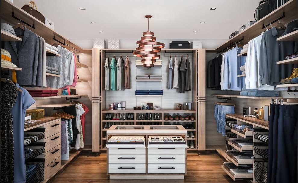 This is an example of a medium sized modern gender neutral walk-in wardrobe in Los Angeles with flat-panel cabinets, medium wood cabinets and medium hardwood flooring.