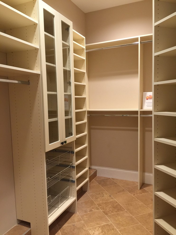 Design ideas for a large contemporary gender neutral walk-in wardrobe in Minneapolis with glass-front cabinets, white cabinets and ceramic flooring.