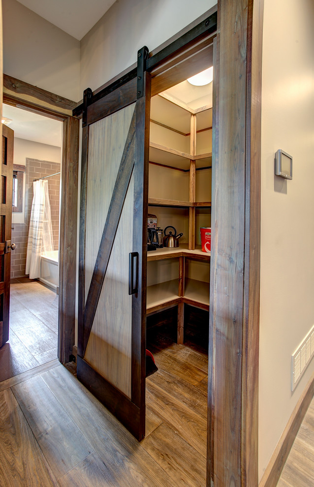 Example of a mountain style closet design in Grand Rapids