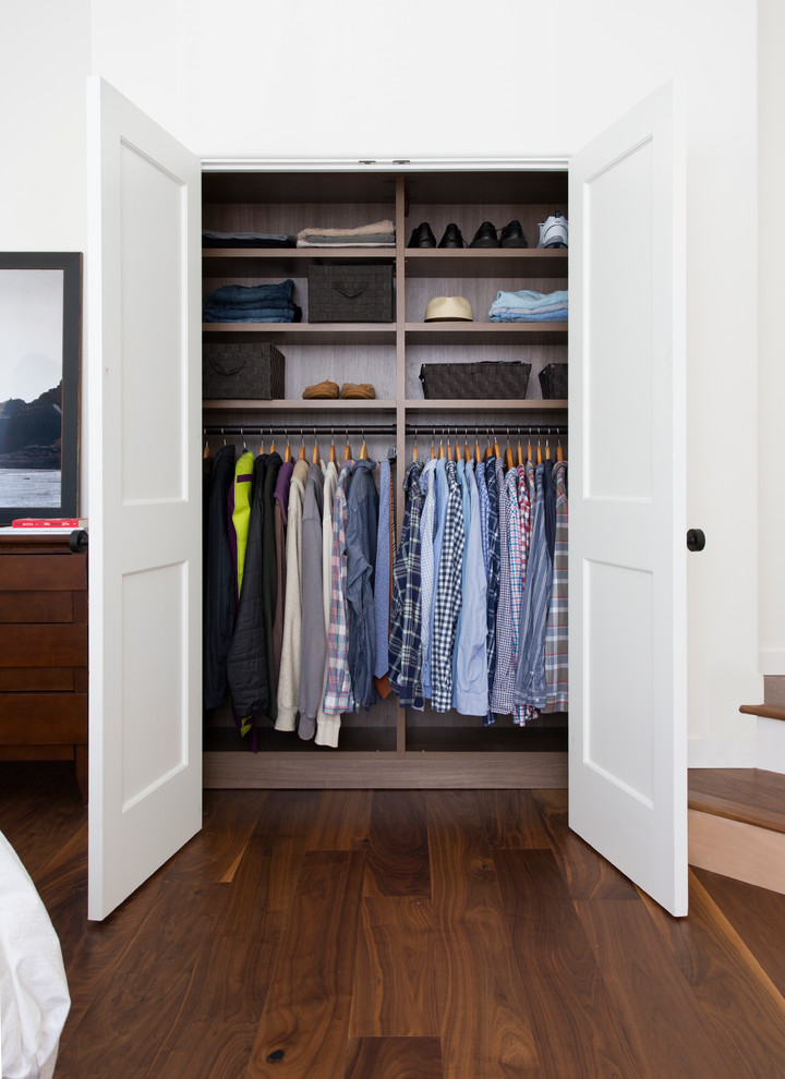 Elegant men's reach-in closet photo in Miami