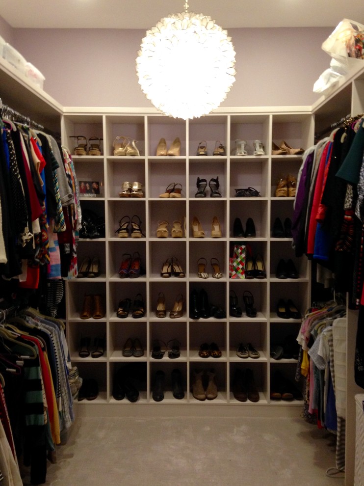 Large transitional women's carpeted and beige floor walk-in closet photo in Boston with open cabinets and white cabinets