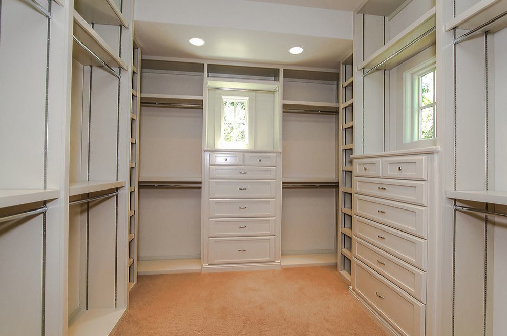 Example of a tuscan closet design in Austin
