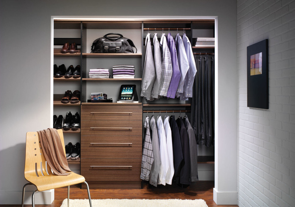 Reach-in closet - small contemporary men's medium tone wood floor and brown floor reach-in closet idea in New Orleans with open cabinets and medium tone wood cabinets