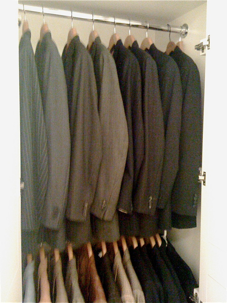 Inspiration for a medium sized contemporary standard wardrobe for men in San Francisco with open cabinets.