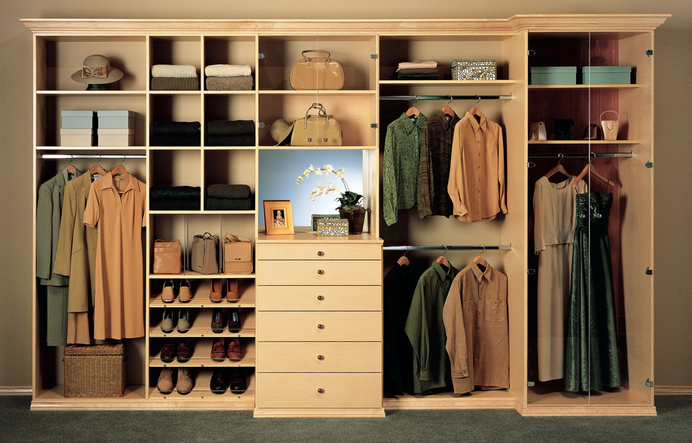 Mid-sized trendy gender-neutral carpeted reach-in closet photo in Los Angeles with flat-panel cabinets and light wood cabinets