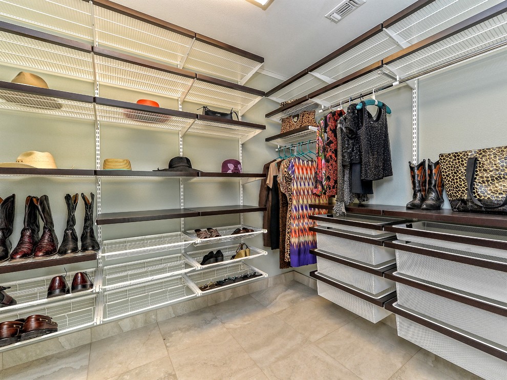 Inspiration for a mid-sized contemporary gender-neutral ceramic tile walk-in closet remodel in Austin with open cabinets and dark wood cabinets