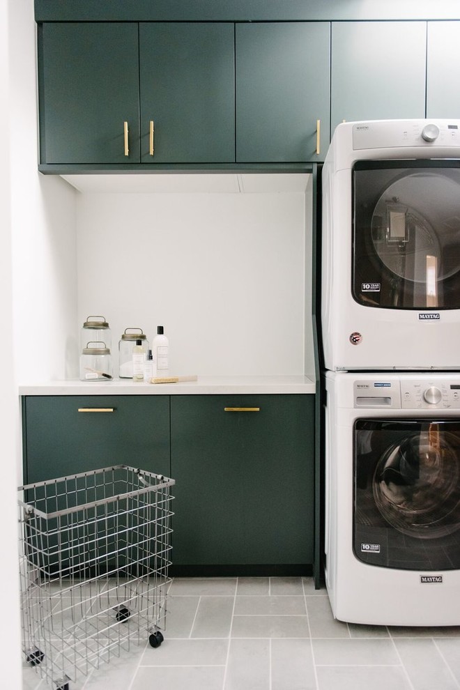 Inspiration for a large classic utility room in Salt Lake City with shaker cabinets, green cabinets, carpet and grey floors.