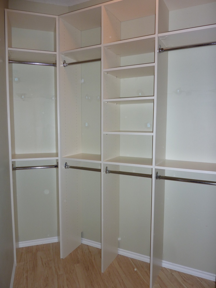 Simple caster closet shelving to separate his and hers Contemporary