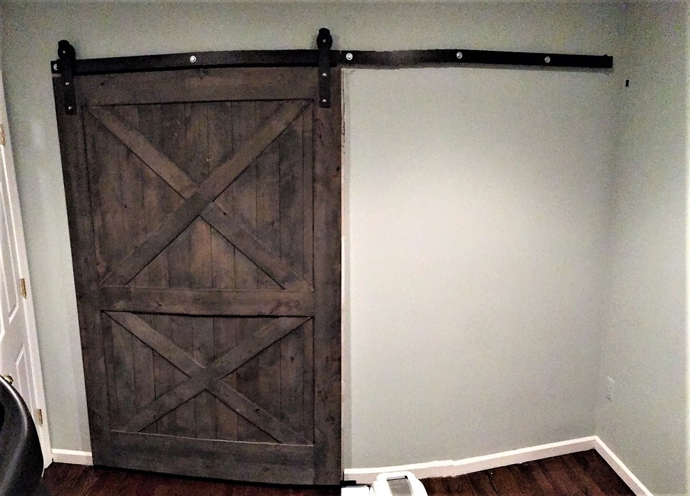 Inspiration for a rustic closet remodel in Newark