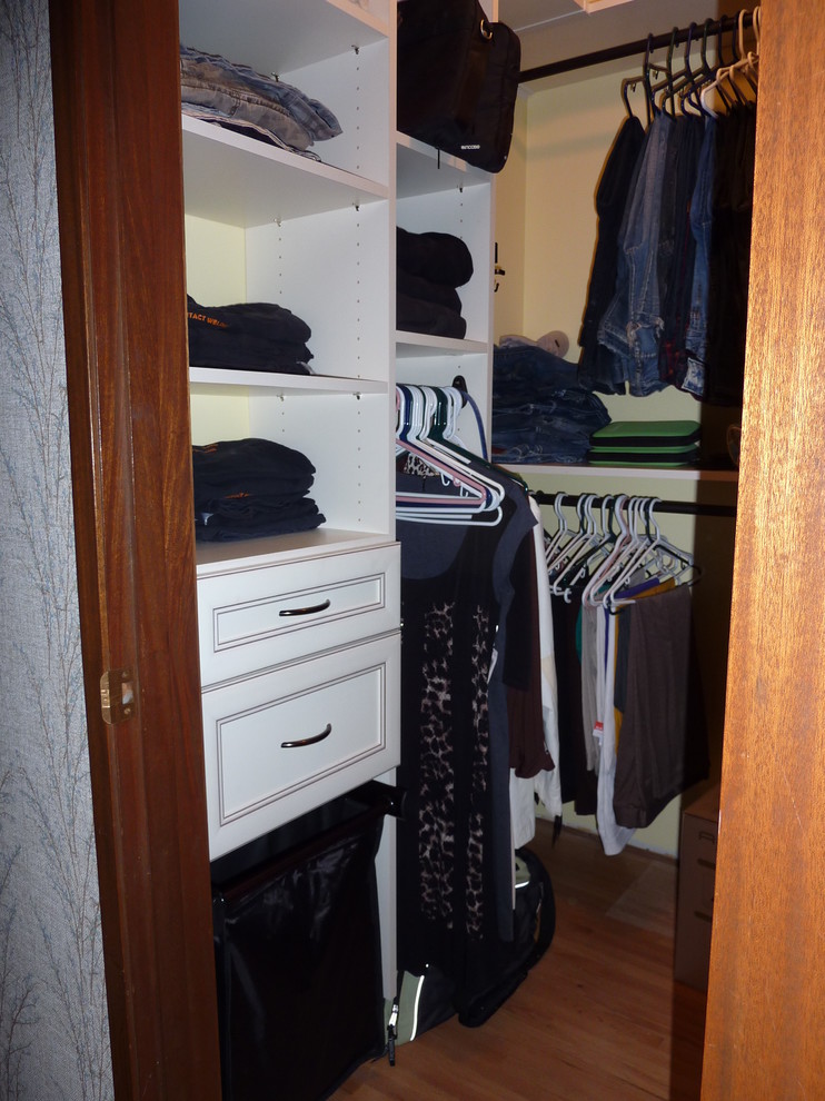 Small Walkin closet with hamper and drawers fully maximized