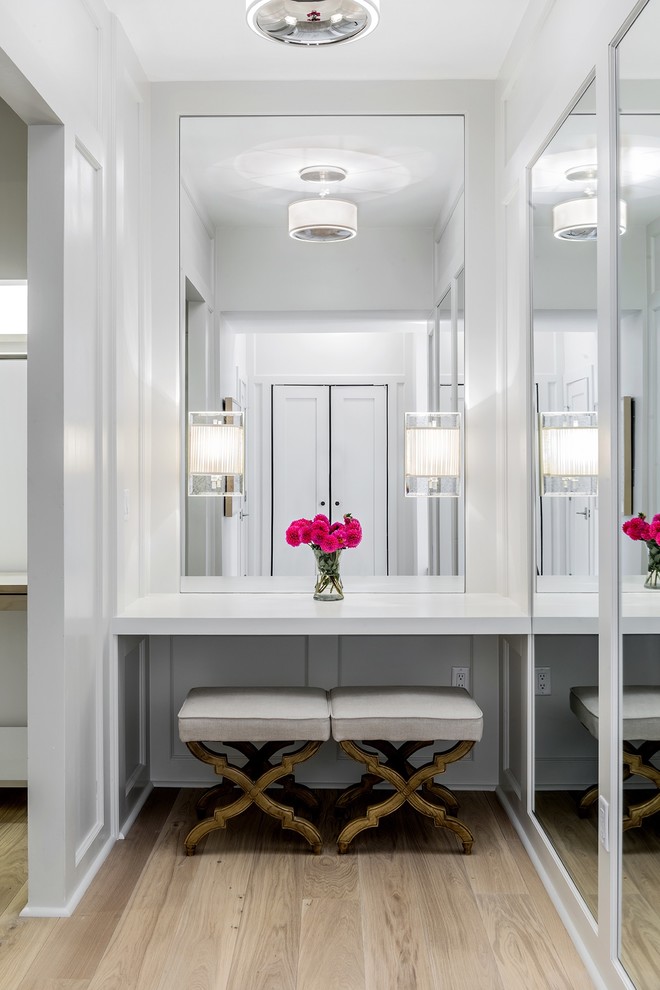 Dressing room - mid-sized contemporary gender-neutral light wood floor and brown floor dressing room idea in Boston