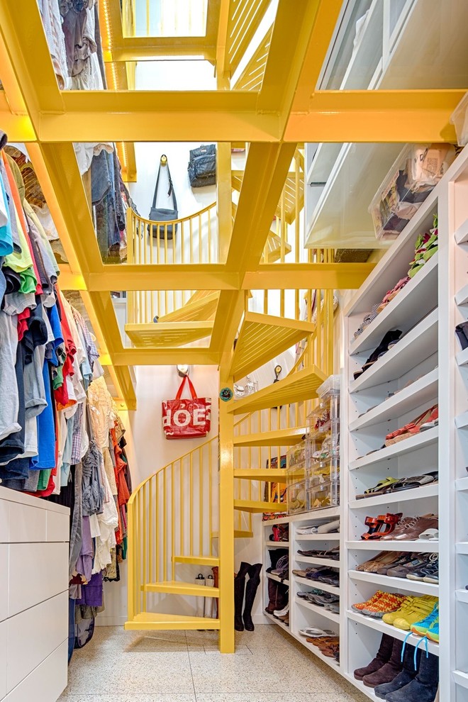 Example of a trendy ceramic tile closet design in Houston