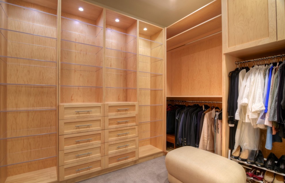 Large classic gender neutral dressing room in San Diego with shaker cabinets, light wood cabinets, carpet and beige floors.