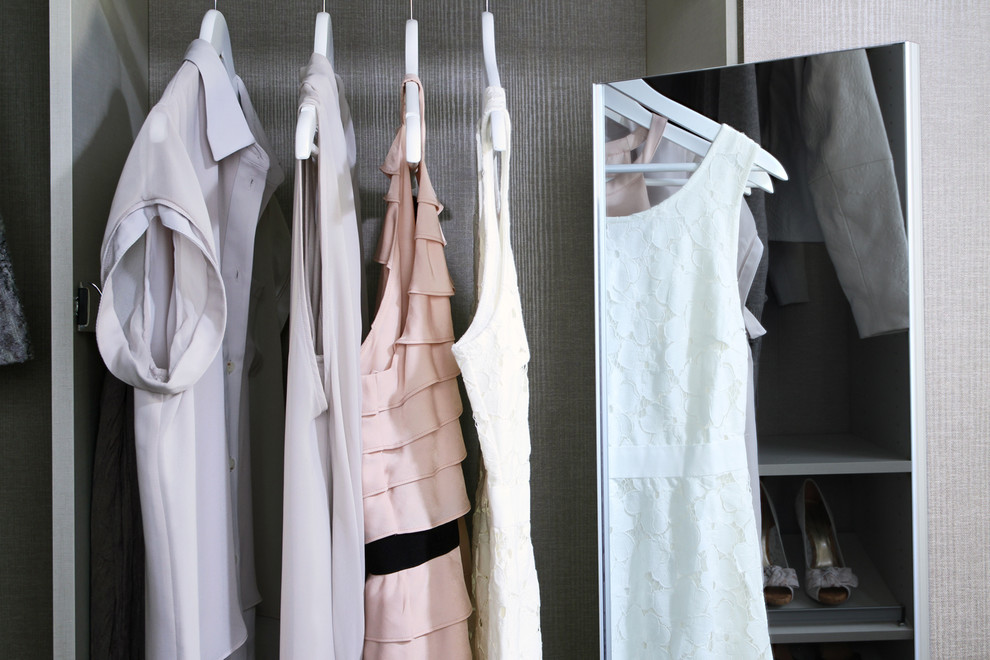 Design ideas for a modern wardrobe in Vancouver.