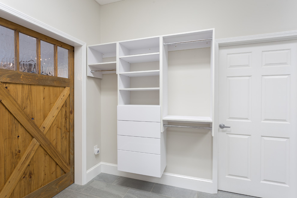 Design ideas for a medium sized classic gender neutral walk-in wardrobe in Other with open cabinets, white cabinets, porcelain flooring and grey floors.