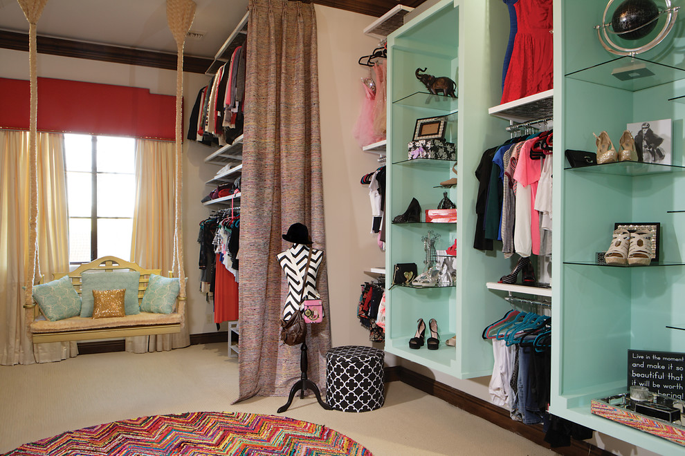 Example of a large transitional women's carpeted dressing room design in Phoenix with open cabinets and blue cabinets